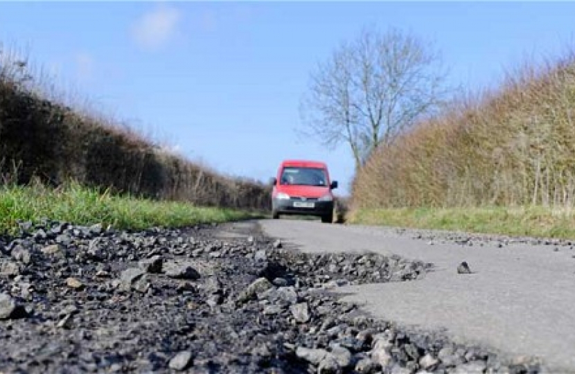 South Lanarkshire's Conservative councillors proposed an extra £2.1m investment in local roads. The bid was blocked by the SNP.